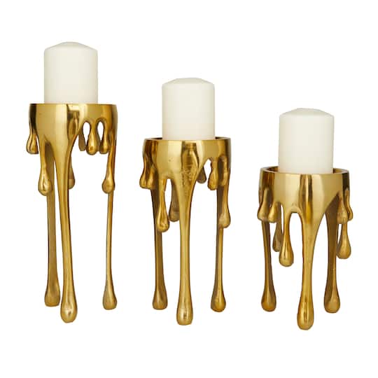 CosmoLiving by Cosmopolitan Gold Aluminum Pillar Candle Holder with Dripping Melting Designed Legs Set